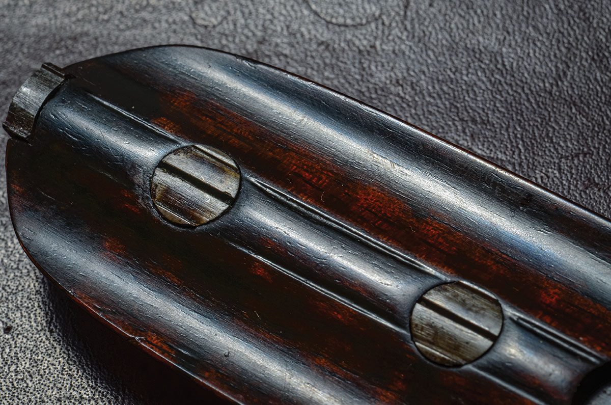 What fine riflemaking can be: The internal pins on the forend are not only timed but sculpted to match the surrounding wood, which in turn is sculpted to hug the barrels.